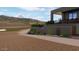 Rendering showing a modern home with desert landscaping adjacent to a golf course and mountain views at 38940 N 54Th St, Cave Creek, AZ 85331