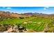 Expansive desert golf course featuring lush green fairways and strategically placed sand traps at 38940 N 54Th St, Cave Creek, AZ 85331