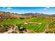 Expansive desert golf course featuring lush green fairways and strategically placed sand traps at 38940 N 54Th St, Cave Creek, AZ 85331