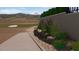 Landscaping along sidewalk with desert vegetation, rock detail, and golf course in the background at 38940 N 54Th St, Cave Creek, AZ 85331