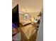 Comfortable bedroom with a decorative rug, side table, and ample space at 41143 W Rio Bravo Dr, Maricopa, AZ 85138