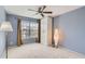 Bright bedroom with large window, carpet, and cozy accents at 4346 E Prickly Pear Trl, Phoenix, AZ 85050