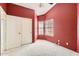 Spacious bedroom with plush carpeting, natural light, and ample closet space at 4346 E Prickly Pear Trl, Phoenix, AZ 85050
