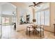 Bright breakfast nook featuring white shutters, a stylish table setting, and an airy, inviting atmosphere at 4346 E Prickly Pear Trl, Phoenix, AZ 85050