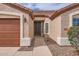 Exterior front facade, showcasing a private entrance, 2-car garage, and desert landscaping at 4346 E Prickly Pear Trl, Phoenix, AZ 85050