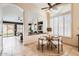 Open concept kitchen with views to dining, granite countertops, stainless appliances, and great natural light at 4346 E Prickly Pear Trl, Phoenix, AZ 85050