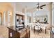 Open kitchen featuring stainless steel appliances and granite countertop island with adjacent breakfast nook at 4346 E Prickly Pear Trl, Phoenix, AZ 85050