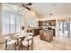 Well-designed kitchen featuring an island, granite countertops, stainless appliances and an eat-in dining area at 4346 E Prickly Pear Trl, Phoenix, AZ 85050
