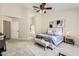 The main bedroom includes an ensuite bathroom featuring a soaking tub and glass enclosed shower at 4346 E Prickly Pear Trl, Phoenix, AZ 85050