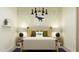 bedroom featuring a bed with decorative pillows and dinosaur wallpaper at 4552 S 232Nd Dr, Buckeye, AZ 85326