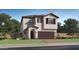 Charming two-story home with a two-car garage, and landscaped yard at 4552 S 232Nd Dr, Buckeye, AZ 85326