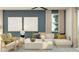 Inviting living room with an L-shaped couch, stylish decor, and natural light at 4552 S 232Nd Dr, Buckeye, AZ 85326