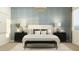Tranquil main bedroom featuring a large bed, stylish nightstands, and modern decor at 4784 S 232Nd Ln, Buckeye, AZ 85326