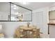 Cozy dining area with round table, adjacent to the kitchen and living areas at 510 N Alma School Rd # 139, Mesa, AZ 85201