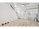 Open-concept living area with lots of light and a staircase at 510 N Alma School Rd # 139, Mesa, AZ 85201