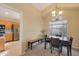 Cozy dining room features a stylish table set and view of the outside greenery at 510 W Marconi Ave, Phoenix, AZ 85023