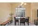 Bright dining area offers a lovely table and chair set with natural light at 510 W Marconi Ave, Phoenix, AZ 85023