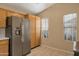 This bright kitchen features stainless steel appliances and custom oak cabinetry at 510 W Marconi Ave, Phoenix, AZ 85023