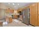 Spacious kitchen with stainless steel appliances, custom cabinetry, and ample counter space at 510 W Marconi Ave, Phoenix, AZ 85023