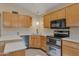 Bright kitchen is equipped with stainless steel appliances and modern countertops at 510 W Marconi Ave, Phoenix, AZ 85023