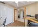 Well-lit office with French doors, offering both privacy and an open feel in the home at 510 W Marconi Ave, Phoenix, AZ 85023