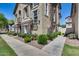 Lovely townhome with stone accents, shutters, and manicured landscaping at 5729 S 21St Ter, Phoenix, AZ 85040