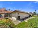 Charming single-story home featuring a three car garage, tile roof, and mature landscaping at 5738 N Scottsdale Rd, Scottsdale, AZ 85253