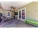 Spacious covered patio with ceiling fan and stylish outdoor furniture, perfect for entertaining at 6014 W Evans Dr, Glendale, AZ 85306