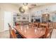 Elegant dining area with a large table, stylish chairs, and seamlessly connected to the living spaces at 6014 W Evans Dr, Glendale, AZ 85306