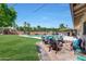 Backyard featuring a cozy seating area with a fire pit, perfect for outdoor gatherings at 609 E Winter Dr, Phoenix, AZ 85020