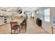 Gourmet kitchen with an island, granite countertops, white cabinets, and stainless steel appliances at 609 E Winter Dr, Phoenix, AZ 85020