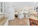 Bright and airy kitchen with white cabinets, granite countertops, and tile floors at 609 E Winter Dr, Phoenix, AZ 85020
