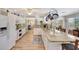 Spacious kitchen featuring granite countertops, a center island, and stainless steel appliances at 609 E Winter Dr, Phoenix, AZ 85020
