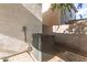 Exterior shot of the AC unit, ensuring comfort during warmer months at 6343 W Sophie Ln, Laveen, AZ 85339