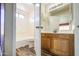 Bright bathroom features wood-look floors and a tub/shower combo at 6428 W Cordes Rd, Phoenix, AZ 85043