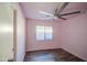 Bedroom features a ceiling fan and natural light at 6428 W Cordes Rd, Phoenix, AZ 85043