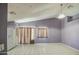 Open kitchen and dining area with tile floors and light fixtures at 6428 W Cordes Rd, Phoenix, AZ 85043