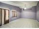 Large living room featuring tile floors, natural lighting, and neutral paint at 6428 W Cordes Rd, Phoenix, AZ 85043
