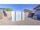 Storage shed located in the backyard with desert landscaping at 6428 W Cordes Rd, Phoenix, AZ 85043