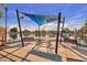 Lakefront picnic area with shaded seating, benches, and scenic views of the lake and surrounding greenery at 722 N Butte Ave, Chandler, AZ 85226