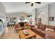 Inviting living room with stylish furniture, hardwood floors, and an open view into the kitchen at 722 N Butte Ave, Chandler, AZ 85226