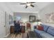 Functional home office with a wooden desk, comfortable seating, ample storage, and soft lighting for a productive workspace at 722 N Butte Ave, Chandler, AZ 85226
