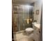 Bathroom with a glass shower, granite countertops and a white vanity at 7474 E Earll Dr # 201, Scottsdale, AZ 85251