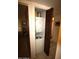 Convenient laundry closet featuring a stacked washer and dryer unit at 7474 E Earll Dr # 201, Scottsdale, AZ 85251