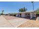 Street view of a single story home with a covered car port and desert landscaping at 808 N 78Th St, Scottsdale, AZ 85257