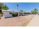 Single-story home featuring desert landscaping, a walkway, and a covered porch at 808 N 78Th St, Scottsdale, AZ 85257