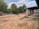 Wide view of a backyard with lots of space and a covered patio at 836 W Laguna Azul Ave, Mesa, AZ 85210