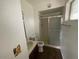 A full bathroom with a toilet, sink, vanity, and shower at 836 W Laguna Azul Ave, Mesa, AZ 85210