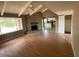 Bright living room with brick fireplace and hardwood floors at 836 W Laguna Azul Ave, Mesa, AZ 85210