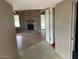 Inviting living room with a brick fireplace at 836 W Laguna Azul Ave, Mesa, AZ 85210
